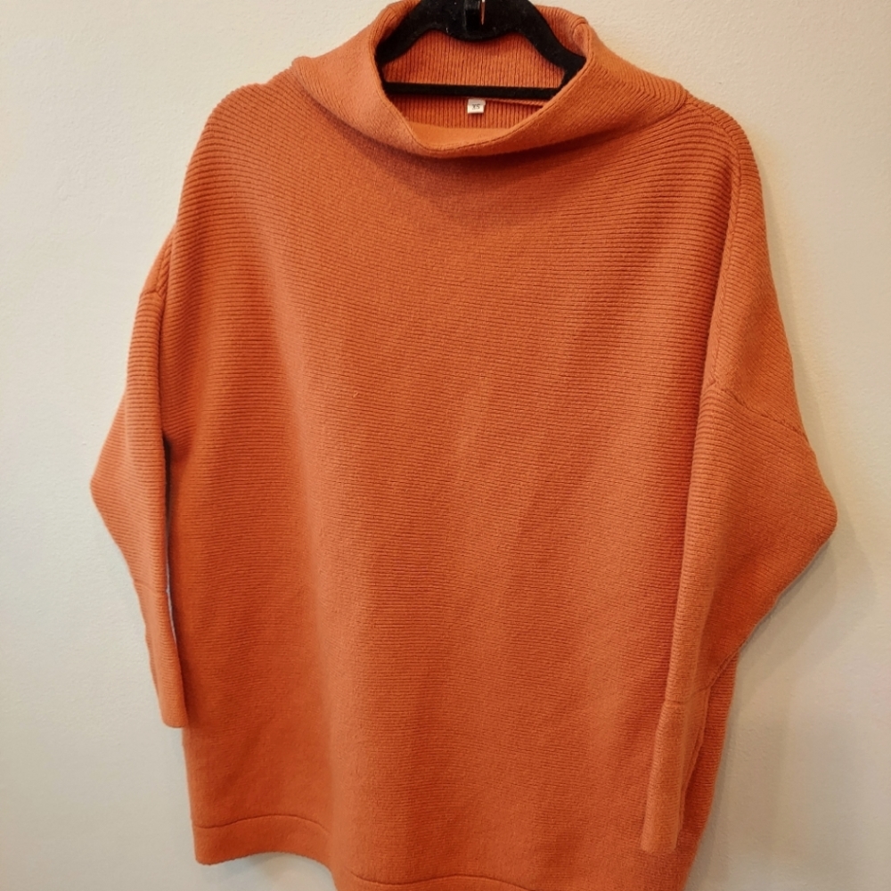 Orange oversized mock neck sweater